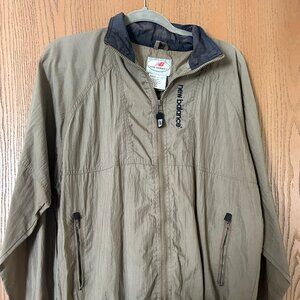 Vintage New Balance Windbreaker. Size Small. Color brown.